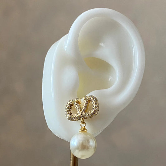 V pearl earrings